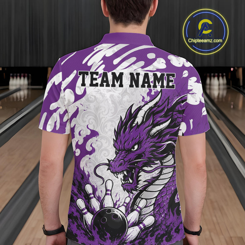 Person wearing a purple bowling shirt with a dragon design and 'TEAM NAME' text at a bowling alley.