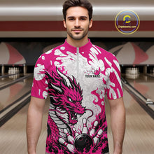 Load image into Gallery viewer, Man wearing a pink and white bowling shirt with a dragon design in a bowling alley.