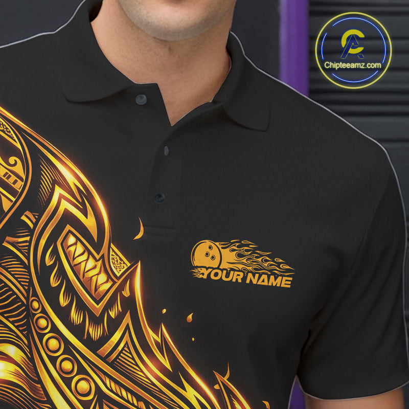Close-up of the left chest on a black and gold bowling polo shirt featuring Polynesian-style bowling artwork with tribal flames.
