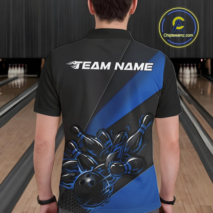 Male model seen from the back in a bowling lane wearing a black and blue polo shirt featuring a flame bowling ball striking pins in a dynamic motion scene.