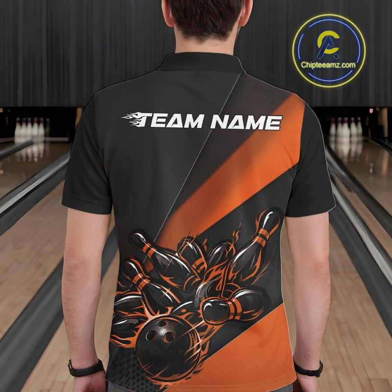 Male model seen from the back in a bowling lane wearing a black and orange polo shirt featuring a flame bowling ball striking pins in a powerful sports motion design.