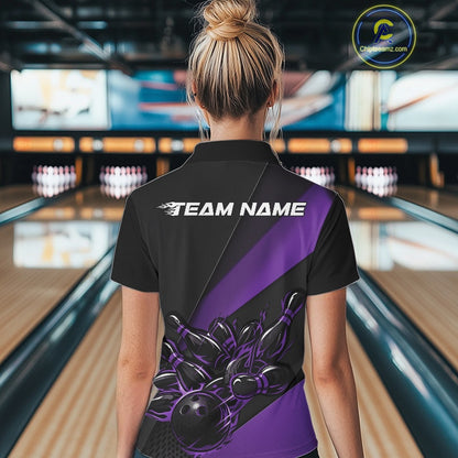 Back view female model at bowling lane wearing black and purple quarter zip shirt featuring fiery bowling ball hitting pins graphics
