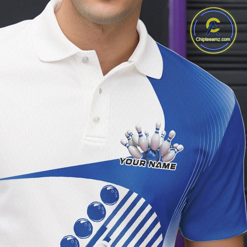 Close-up of the left chest area of a white and blue bowling polo shirt, featuring a dynamic bowling strike graphic with wavy geometric stripes.