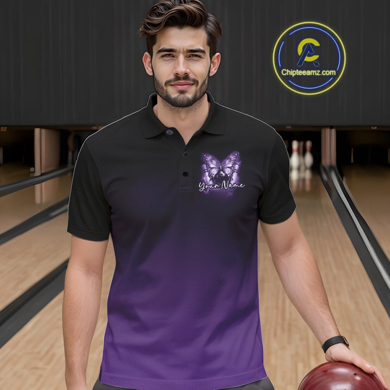 Male model wearing a purple bowling polo shirt at a bowling lane with luminous butterfly artwork, a bowling ball, and fallen bowling pins.