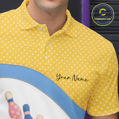 Close-up of the left chest area on a bowling polo shirt featuring colorful bowling ball and pin patchwork graphics with polka dot accents.