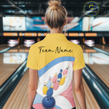 Back view of a female model in a bowling alley wearing a polo shirt showcasing colorful bowling-themed patchwork artwork.