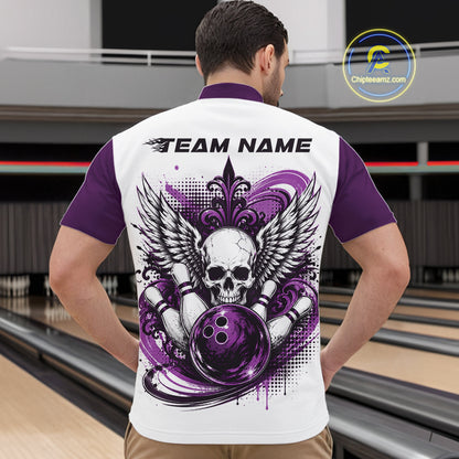 Back view of a man in a bowling alley wearing a bowling shirt with quarter zip collar, purple skull-themed bowling graphic with black wings, pins, bowling ball shirt with “Team Name” across the shoulders.