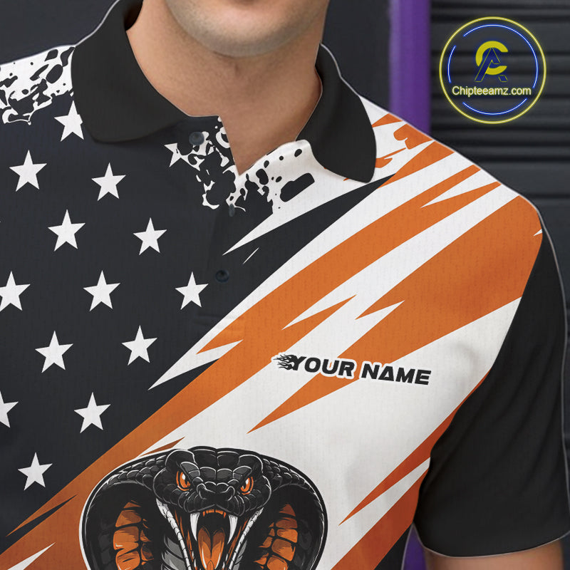 Close-up of a black, white, and orange bowling polo with star graphics, diagonal lightning-style stripes, and “Your Name” text on the chest.