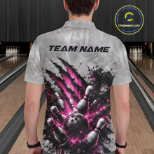 Load image into Gallery viewer, Back view of a male model wearing a gray bowling polo shirt featuring a dramatic pink bowling ball and pins graphic with claw-mark artwork in a bowling lane.