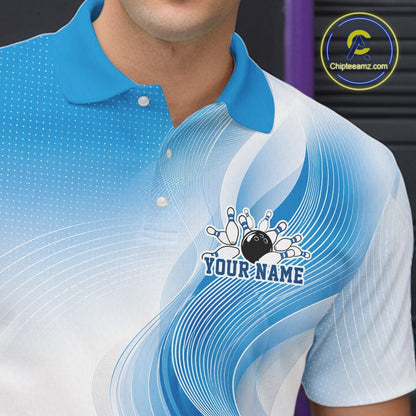 Detailed close-up of the left chest area on a white and blue bowling polo shirt with abstract wave artwork and bowling imagery