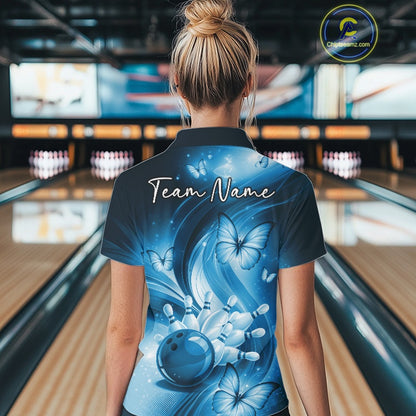 Back view of a blue womens bowling polo displaying bowling pins and butterfly-themed accents.