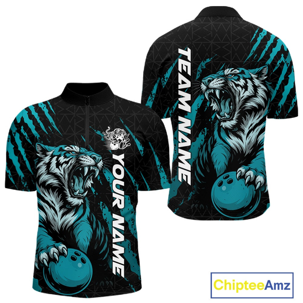 Front and back view of a black and teal blue men's bowling quarter-zip shirt featuring a roaring tiger holding a teal blue bowling ball with teal blue claw-stripe artwork and a geometric background pattern.