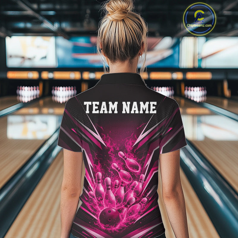 Back view female model wearing polo shirt with flaming bowling ball striking pins red fiery bowling artwork