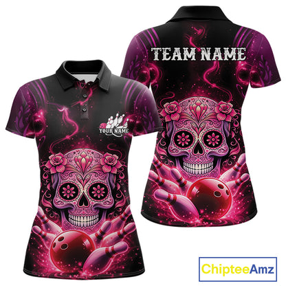Front and back view of a black and pink women’s bowling polo shirt featuring a floral sugar skull above a bowling ball and pins in Day of the Dead style.