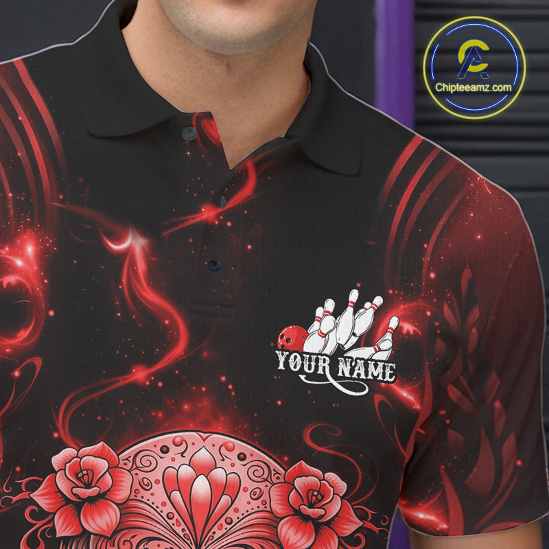 Close-up of a black and red bowling polo shirt left chest showing Day of the Dead sugar skull above a bowling ball and pins.