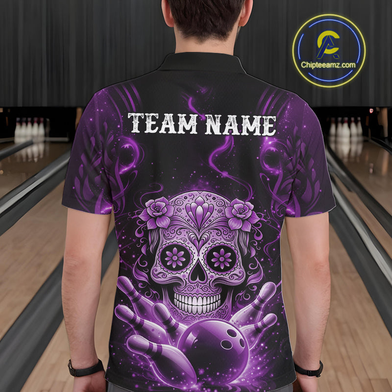 Back view of a male model in a bowling alley wearing a black and purple polo featuring floral sugar skull and bowling pins motif.