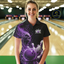 Load image into Gallery viewer, Front view of a female model in a bowling alley wearing a black bowling polo with a purple flaming skull, lightning, bowling pins, and a custom name.
