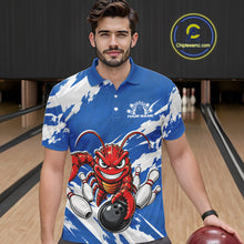 Load image into Gallery viewer, Front view of a male model in a bowling alley wearing a blue custom bowling polo shirt with a fierce yet funny crawfish bowling character and a distressed background design.