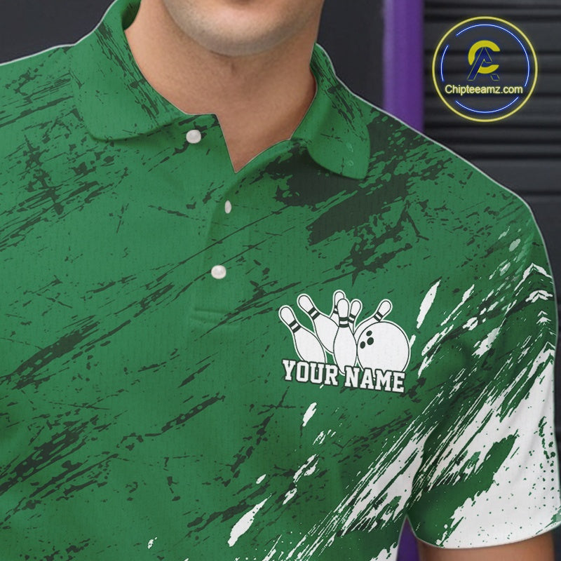Close up of the left chest area on a white and green bowling polo shirt featuring a splatter style sports jersey design