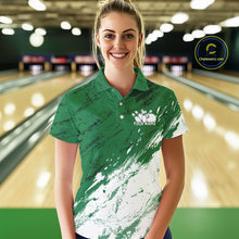 Load image into Gallery viewer, Woman wearing a green and white polo shirt with a logo in a bowling alley.