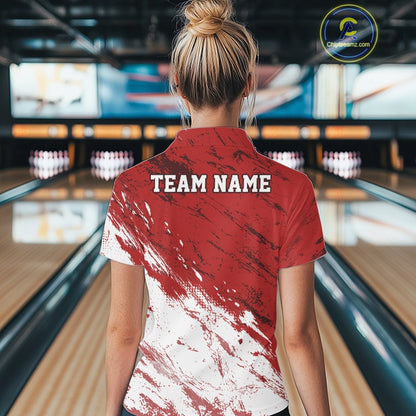 Person wearing a red and white shirt with 'TEAM NAME' on the back in a bowling alley.