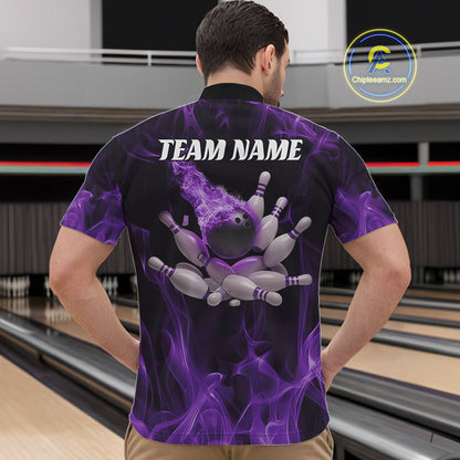 Front view of a male model in a bowling venue wearing a black and purple quarter-zip shirt showcasing a bowling ball and scattered pin motif.