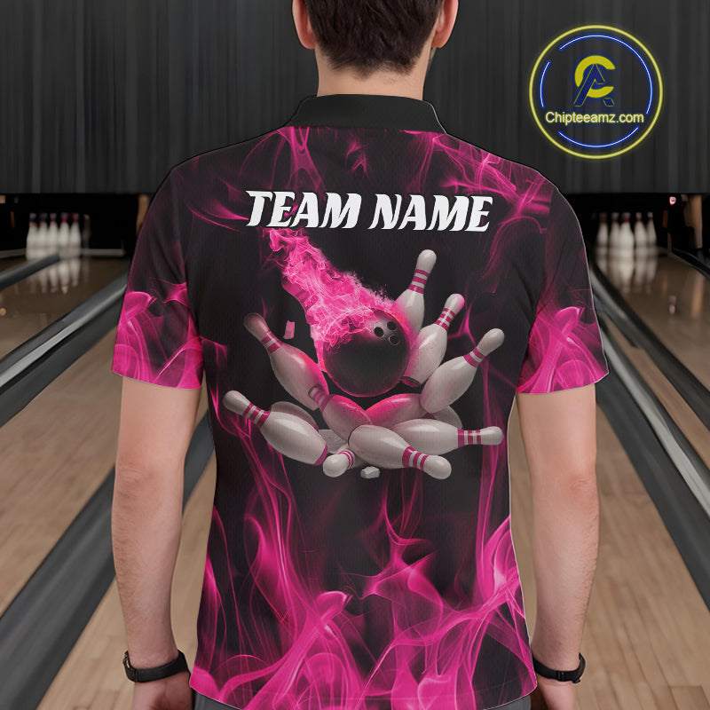 Back view of a male model in a bowling center wearing a black and pink polo showcasing bowling pins scattering with flame effects.