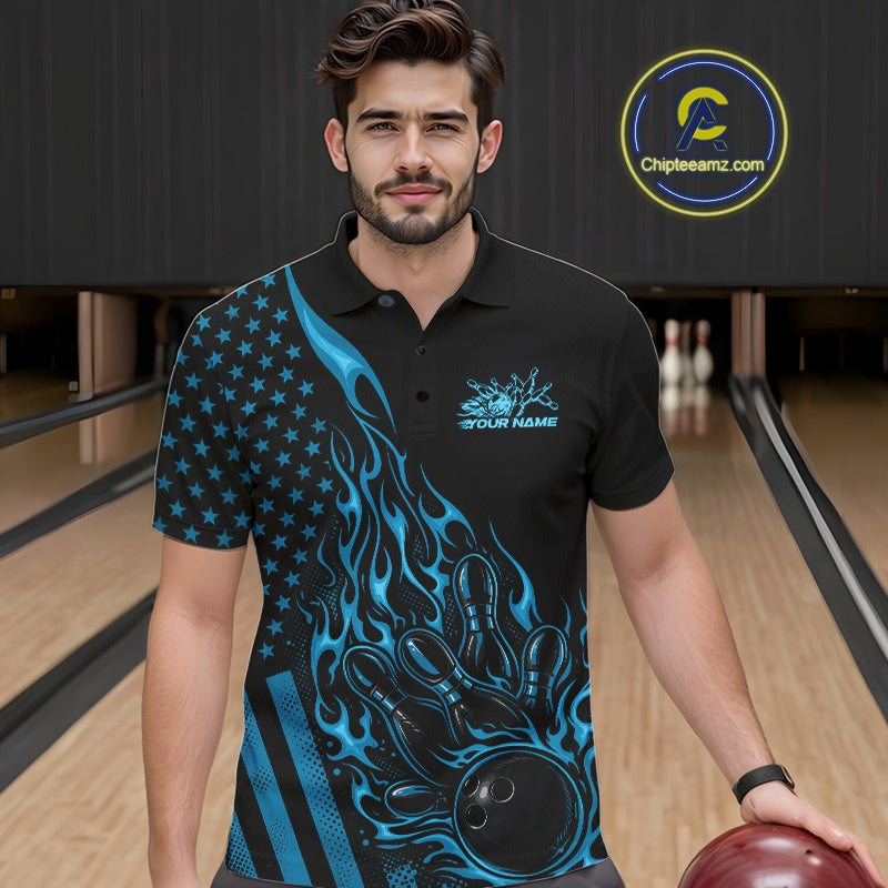 Male model wearing a black bowling polo shirt at a bowling lane with blue flame bowling strike artwork and patriotic accents.