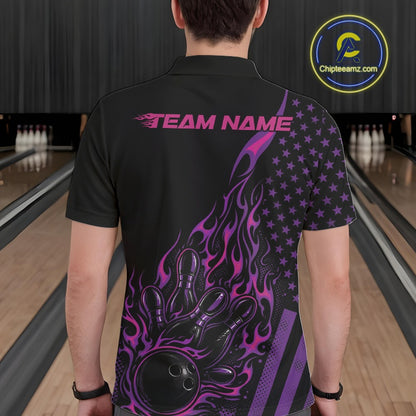 Back view of a male model in a bowling center wearing a black polo shirt showcasing a colorful flaming bowling strike scene.