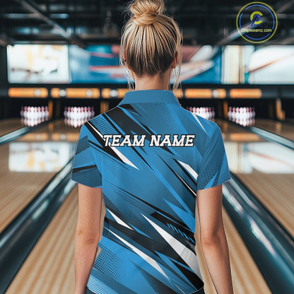 Person wearing a blue bowling shirt with 'TEAM NAME' on the back in a bowling alley.