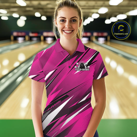 Woman wearing a pink bowling shirt with a logo and text on a bowling alley background