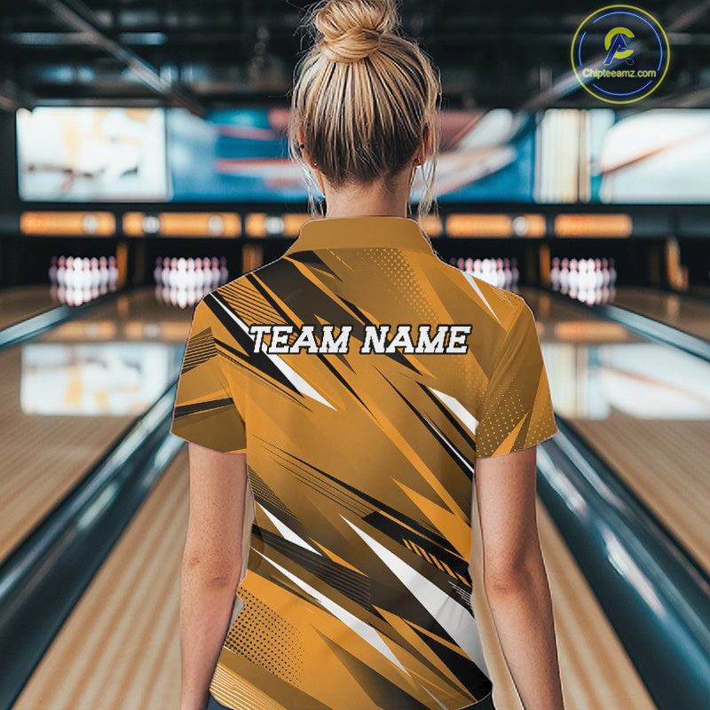 Person wearing a yellow bowling shirt with 'TEAM NAME' text in a bowling alley.