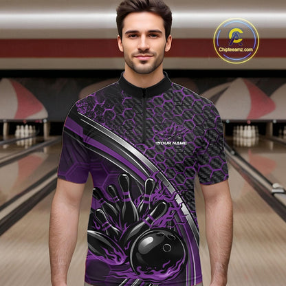Male model in a bowling lane wearing a black and purple quarter zip shirt with honeycomb accents and a fiery bowling strike illustration.