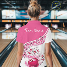 Load image into Gallery viewer, Back view of a female model in a white and pink bowling quarter zip with butterfly artwork and bowling graphics at the bowling lane