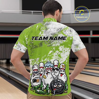 Male model at a bowling lane wearing green and white quarter zip shirt, front view showcasing grunge background with cartoon bowling pins and bowling ball illustration