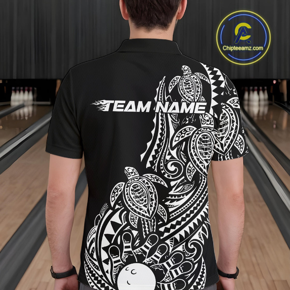 Back view of a male model in a black and white bowling polo shirt featuring turtle-themed bowling artwork and swirl accents.