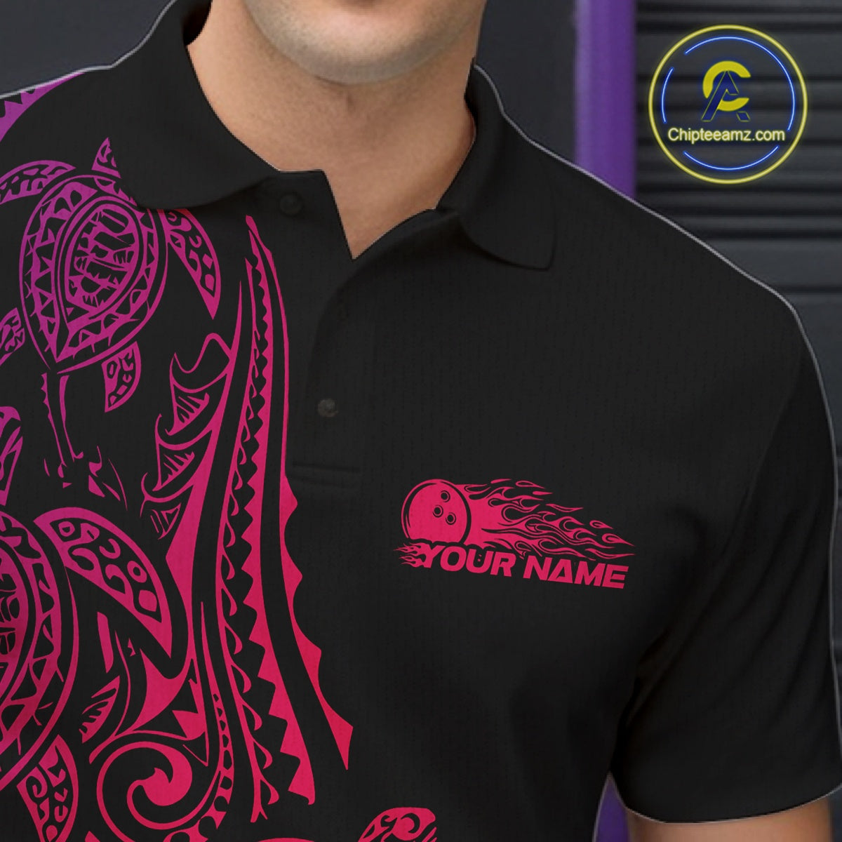 Left chest close-up of a black, pink, and purple bowling polo shirt featuring Polynesian-inspired bowling motifs.