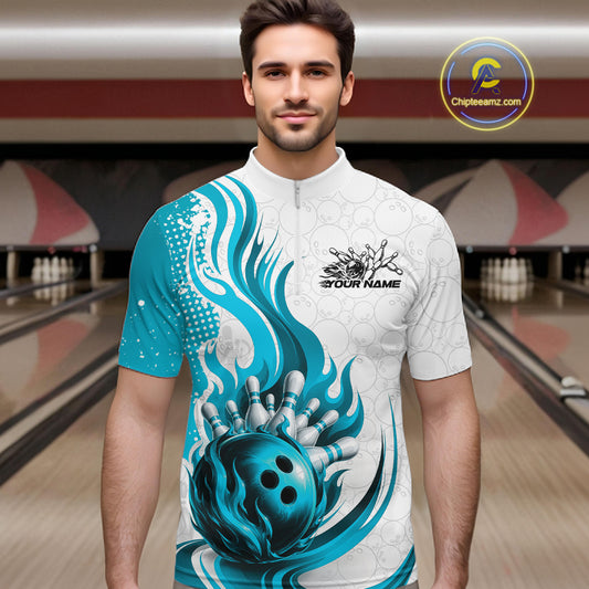 A man wearing a short-sleeve bowling-themed jersey with a white and teal graphic design featuring a bowling ball and flame-like swirls, set against a blurred bowling alley background.