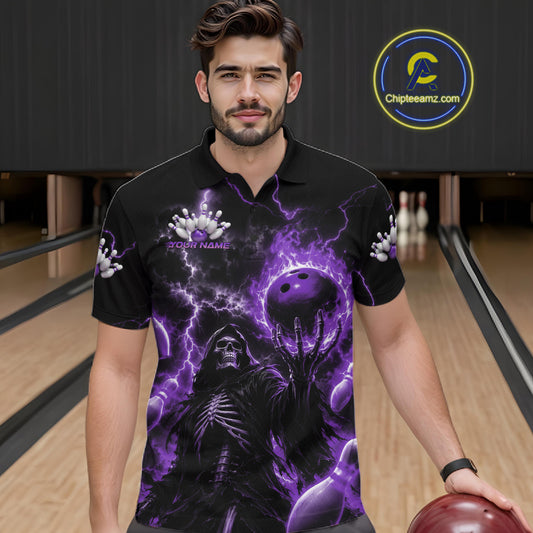 A man wearing a black short-sleeve polo shirt with a purple and black graphic print of a skeleton and lightning, standing in a bowling alley