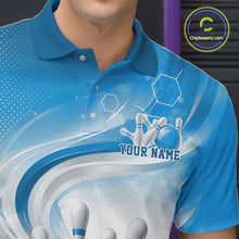 Load image into Gallery viewer, Close-up of the left chest on a white and blue bowling polo shirt showing abstract wave lines with a glossy bowling ball striking pins.