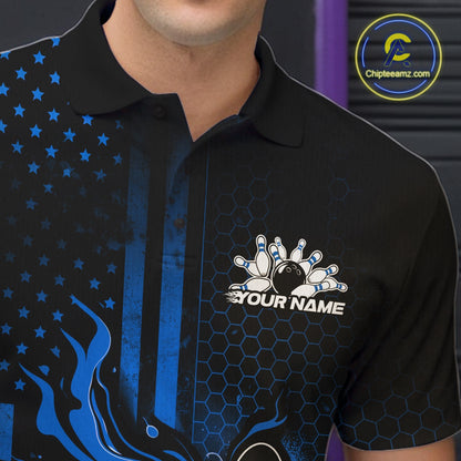 Close-up of a black and blue bowling polo shirt left chest showcasing patriotic flames and bowling ball striking pins artwork.