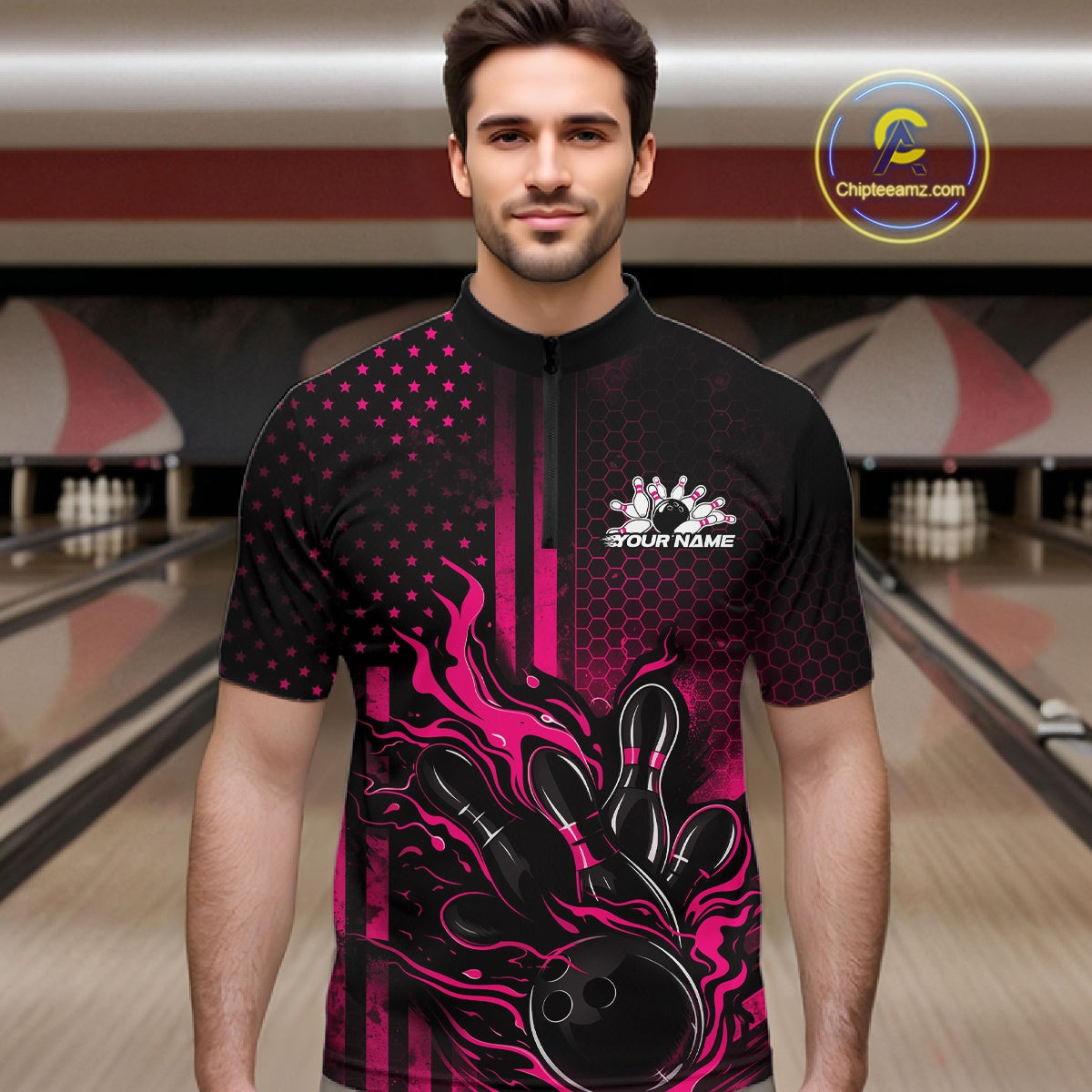 Male model wearing a black and pink bowling quarter-zip shirt at a bowling lane with fiery bowling strike graphics and patriotic flag-inspired accents.