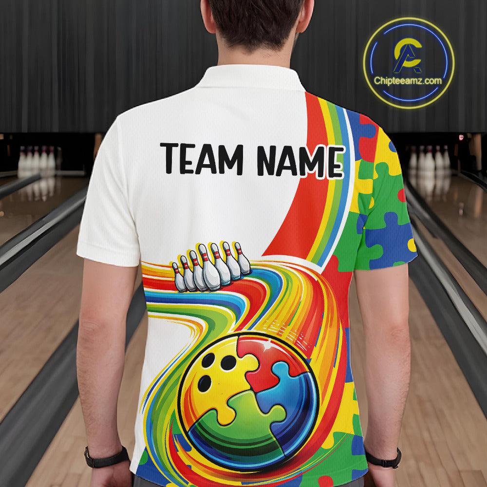 Male model in a bowling alley wearing a polo shirt, back view showcasing colorful autism-themed bowling lane artwork with vibrant puzzle-inspired graphics