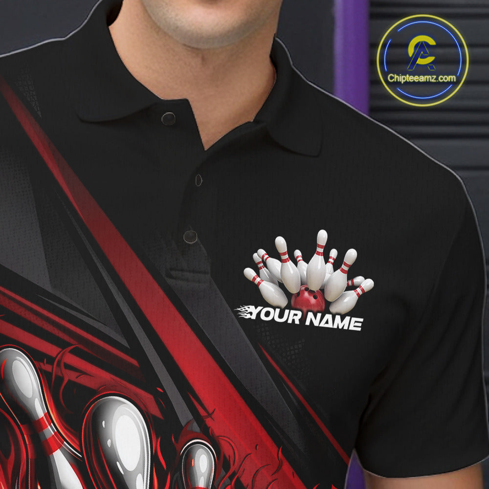 Close-up left chest detail of black bowling polo shirt showcasing red flame bowling ball and pins emblem with geometric stripe accents