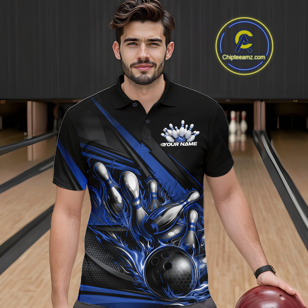 Male model in a bowling lane wearing black polo shirt, front view featuring blue flame bowling ball hitting pins with dynamic stripe graphics