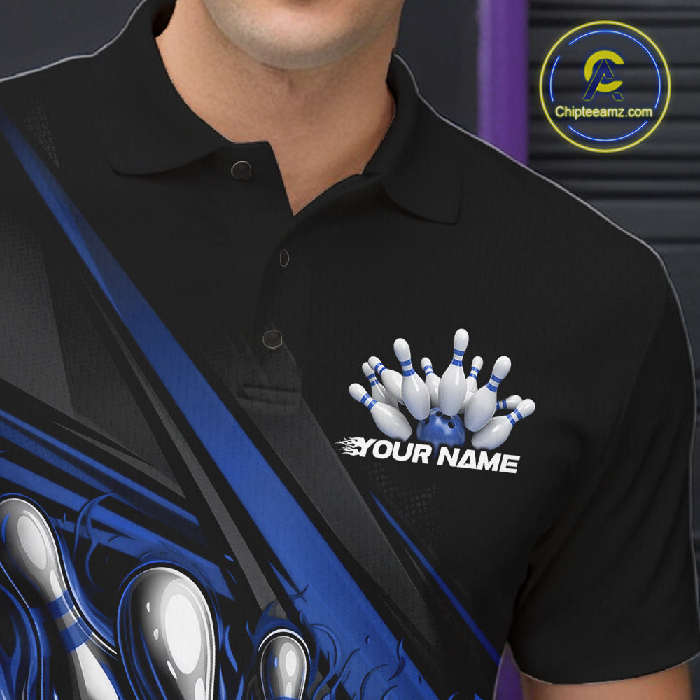 Close-up left chest detail of black bowling polo shirt featuring blue flame bowling ball and pins emblem with geometric stripe artwork