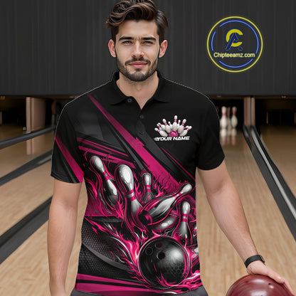 Male model in a bowling lane wearing black polo shirt, front view featuring hot pink flame bowling ball hitting pins with bold geometric design