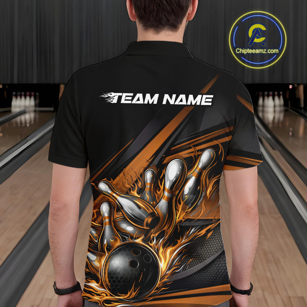 Male model at a bowling lane, back view of black polo shirt showcasing gold flame bowling ball and pins with abstract geometric design