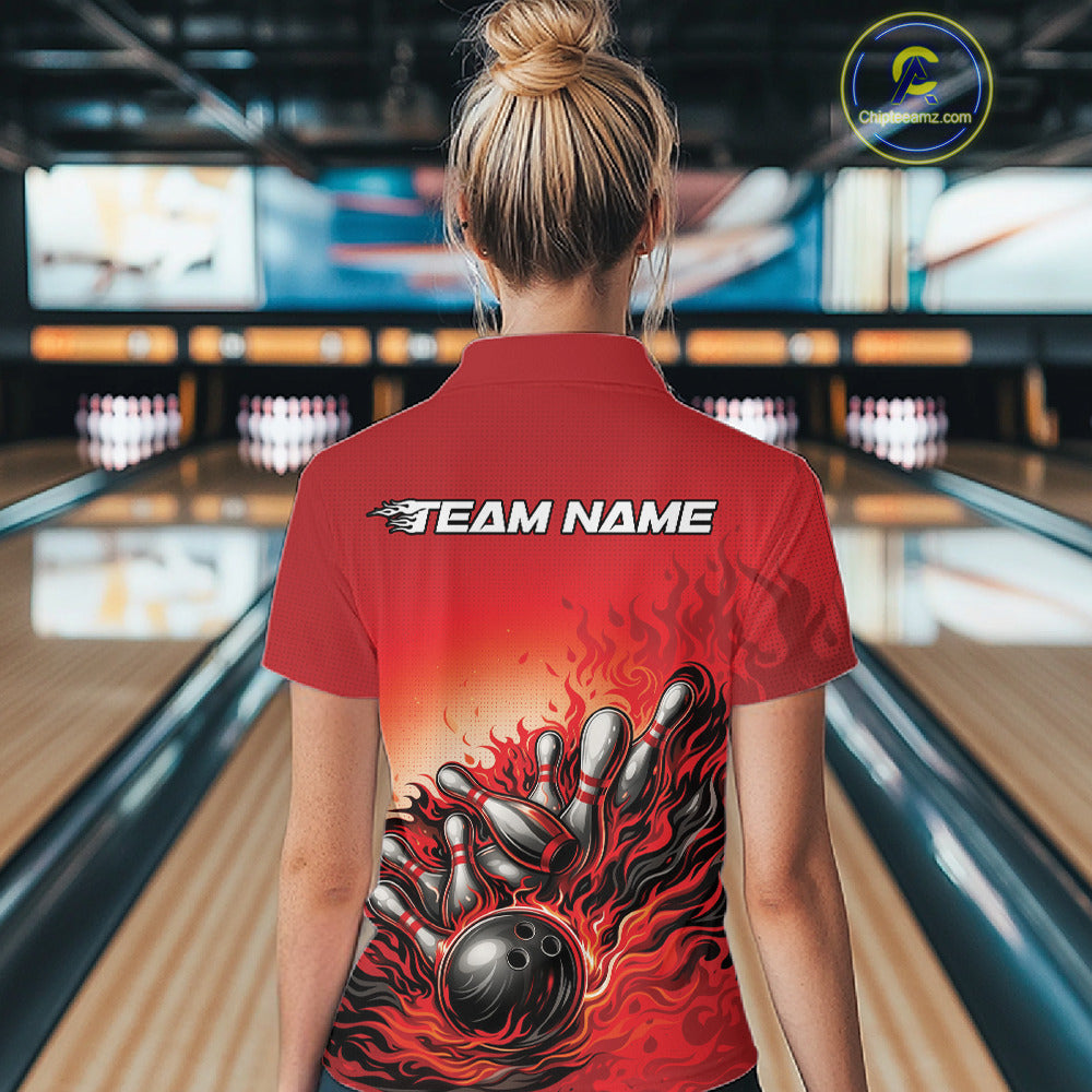 Female model at a bowling lane, back view of a red polo shirt featuring flame bowling ball and pins action scene design