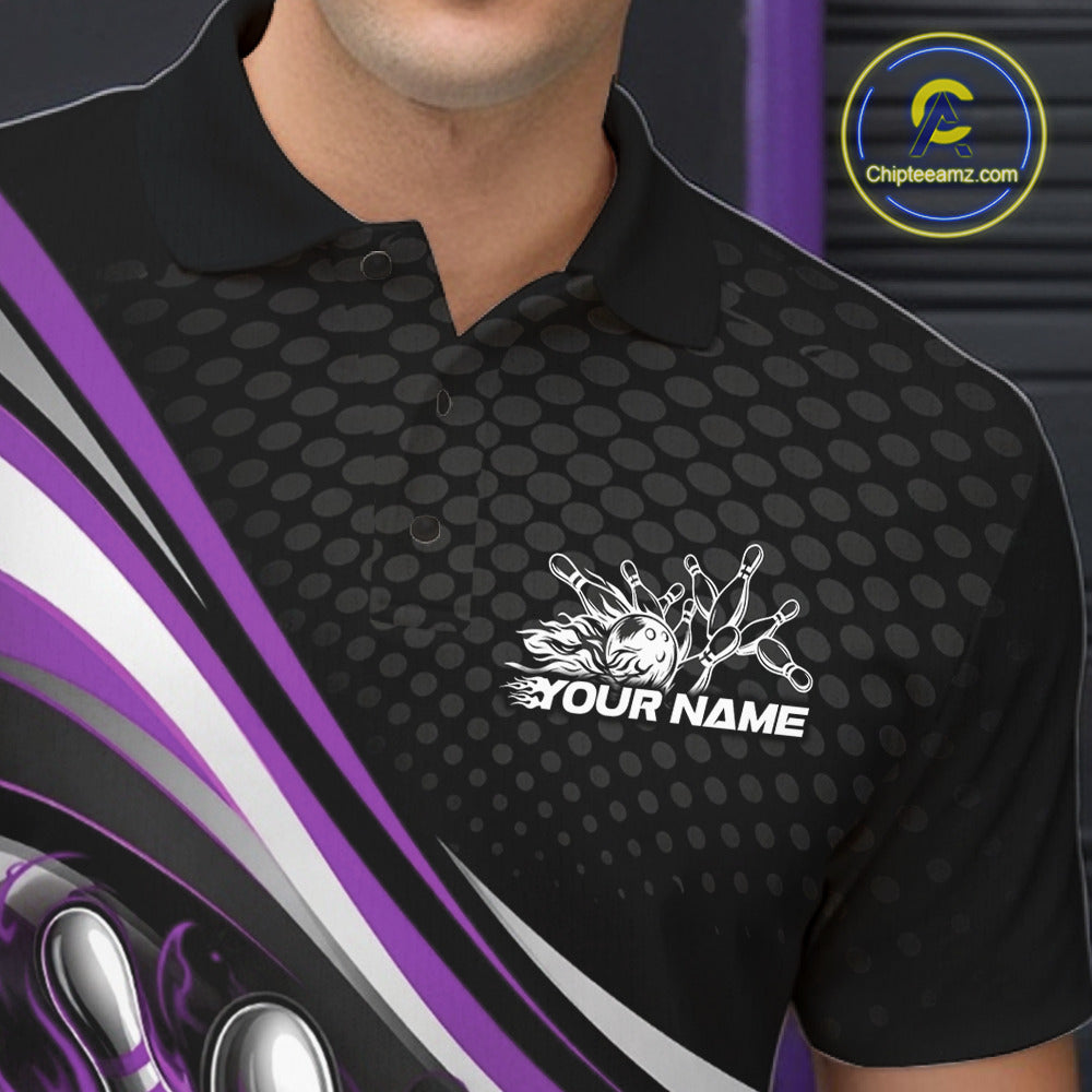 Close-up view of left chest area of a black and purple polo shirt, showing small flame bowling ball and pins graphic detail.